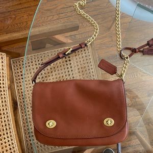 COACH leather bag with brass strap